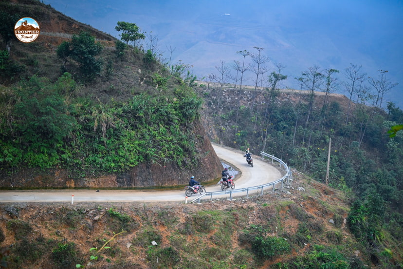 Big bike riders navigating Vietnam&rsquo;s mixed traffic safely.